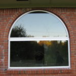 Large Round Top Window: After (Exterior)